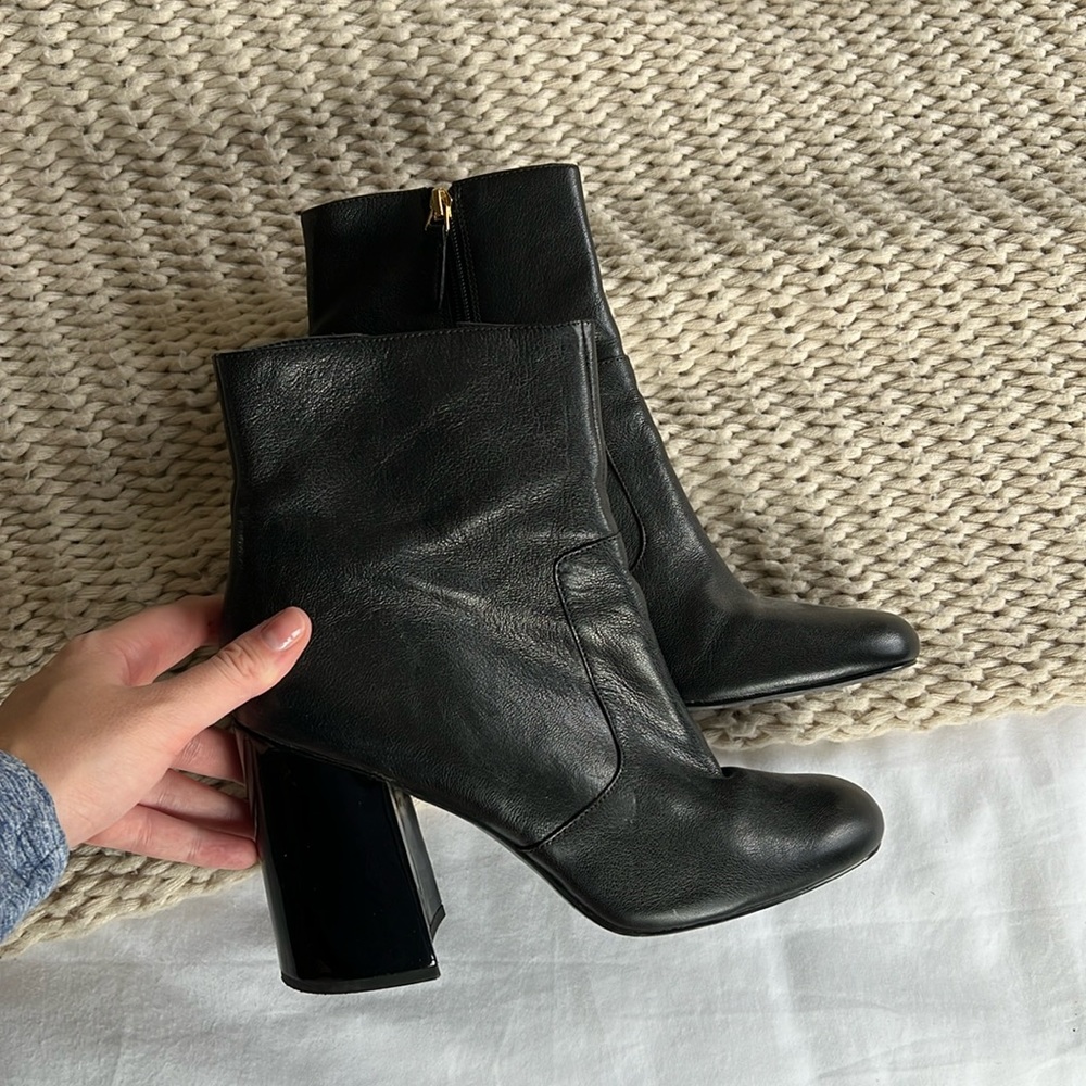 Black patent leather heeled boots